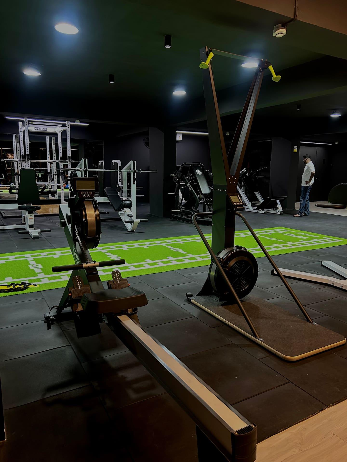 Tomz Fitness Club: rower, SkiErg, and turf track